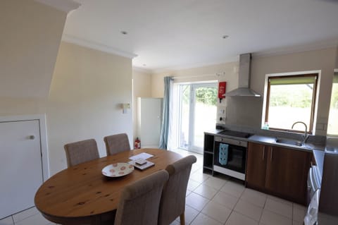 Kitchen / diner with views across the garden.
