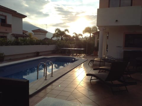Sun set over the pool