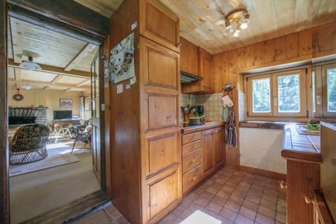 Kitchen with access to the living room