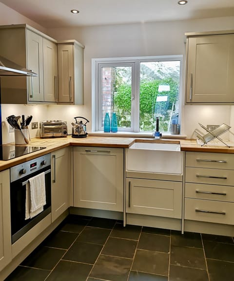 Modern , well equipped kitchen.