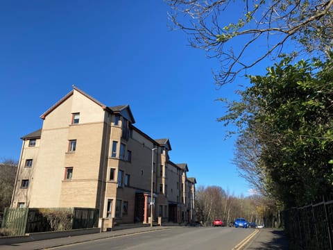 External picture of Queenshill, the car park situated on the left and rear.