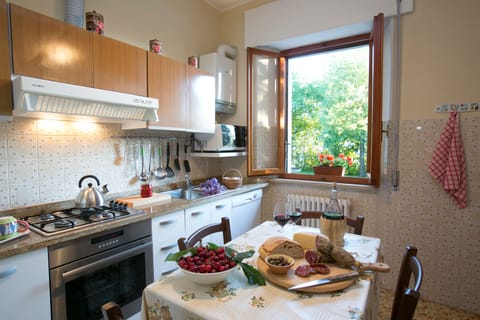Well equipped kitchen diner overlooking the pool