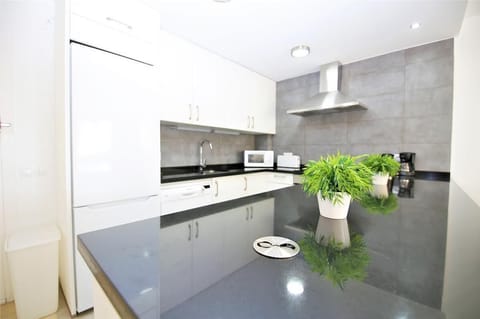 The modern kitchen also has breakfast bar