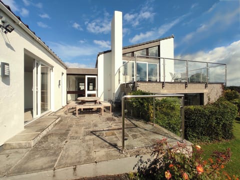There's two patios, outside the kitchen, and the upper patio outside the lounge