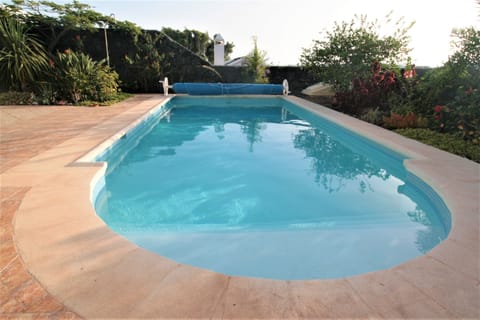 You will love the large, private, solar heated pool.