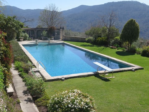 The beautiful swimming pool in the chateau gardens