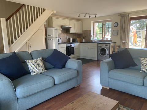 Spacious open plan downstairs with French doors both sides so light floods in