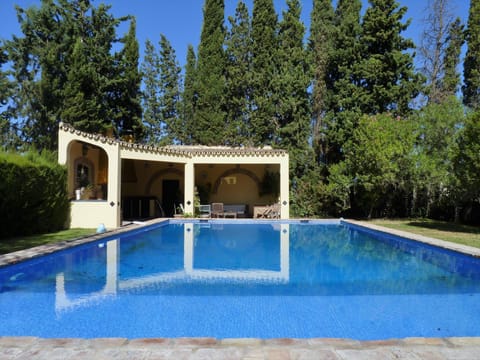 Swimming pool of 15 x 6 m. and outdoor dining area