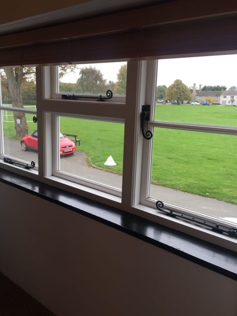 Double bedroom overlooking village green.