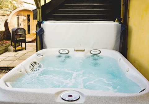 Relax and unwind in the bubbling Jacuzzi.