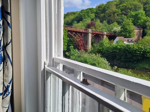 SIT IN OUR COSY LOUNGE AND ENJOY THE VIEW OF THE 1ST IRON BRIDGE IN THE WORLD
