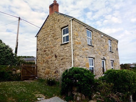 House and parking spot on Left
