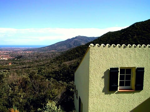 Set in the woods with wonderful seaward views