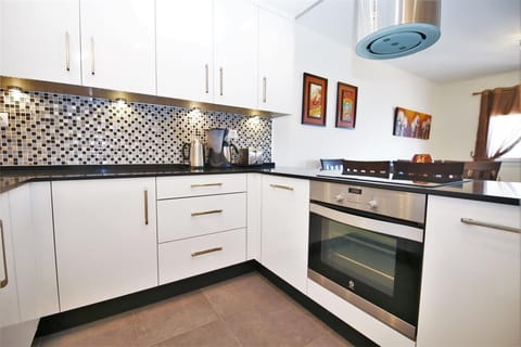 Modern kitchen is fully equipped with all the appliances