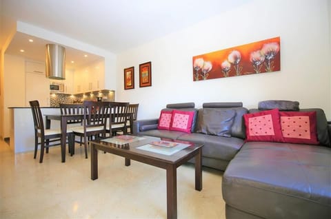 Lounge with large leather sofa and air conditioning