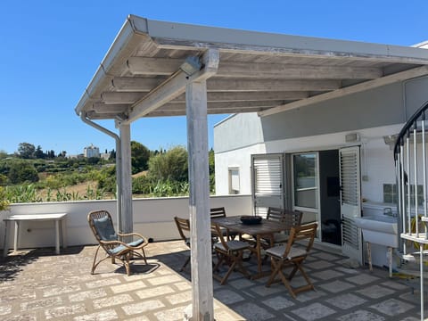 The main terrace is perfect for al fresco dining whatever the weather