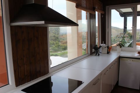 Kitchen views to the mountain and golf