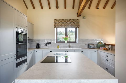Kitchen with double oven and warming drawer.