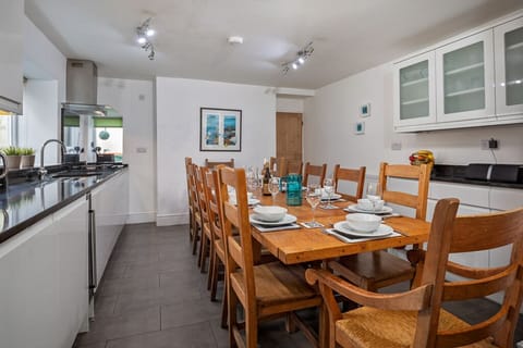 Kitchen with large oak table and chairs for 12