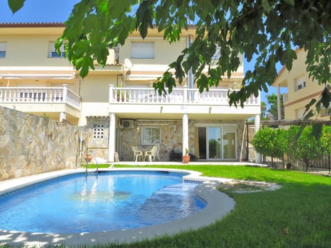 VILLA CAROLINA, back side, garden, pool, BBQ.
