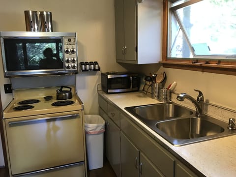 Microwave, coffee maker, toaster, dishware, pots & pans