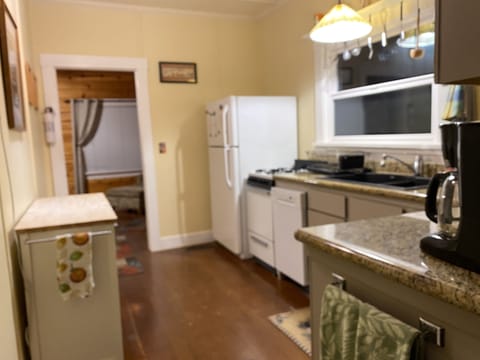 Kitchen with dishwasher and disposal.