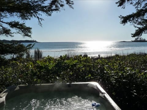 Watch summer sunset from our hot tub.