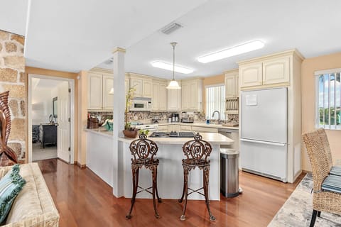 Upstairs Kitchen, fully stocked with cookery and JennAire counter grill
