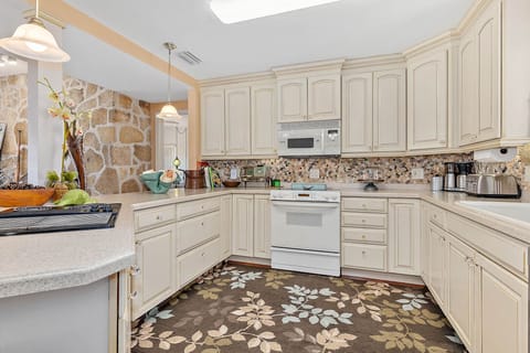 Backsplash made of beach collected shells and gems
