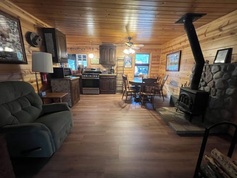 Newly installed plank flooring. Comfortable on the feet and a soft wood tone.