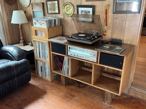 Newly added 70’s era stereo tuner and turntable. Have fun listening to vinyl.