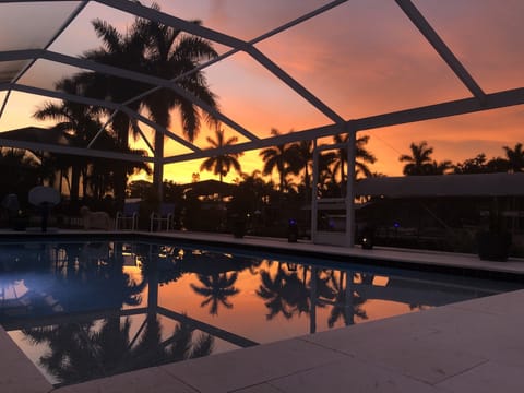 Sunset with reflection on the pool. We get incredible sunsets and sunrise