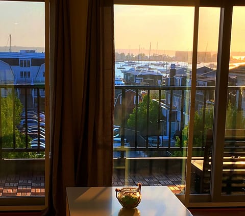 Enjoy the sunset over Newport Harbor from the private, spacious balcony.