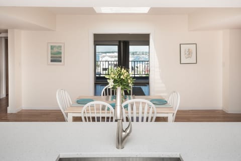 Enjoy views of Newport Harbor from the kitchen and dining room.