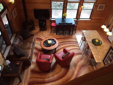 Overview of Family Room, Dining Table and Bar area in Kitchen