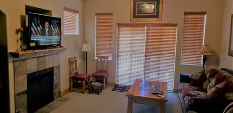 Family Room - flat screen tv, sofa, 2 recliners (not shown in picture)