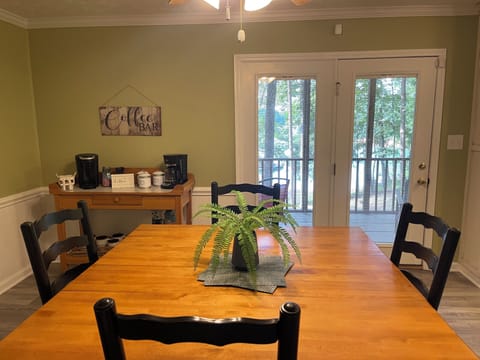 Seating for 8 at the dining table overlooking the lake. 