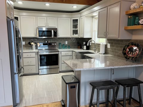 The kitchen was completely redone in 2022 and has plenty of cooking necessities.