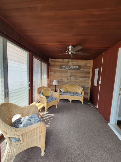 Cozy from porch to relax, read or enjoy the morning paper and coffee.