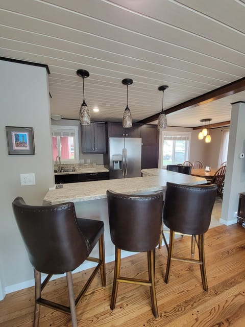 Additional bar seating for socializing or eating.