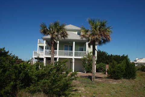 View of 3 Monkeys as you drive into Sandspur Trail