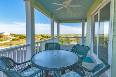Enjoy extra outdoor dining with ocean breezes and lovely view!
