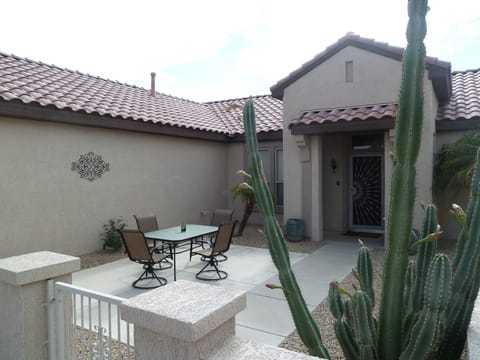 Walled in front courtyard