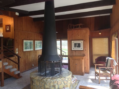 Beautiful 360 degree open fireplace. (wood not provided)