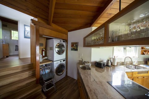 Laundry is adjacent to kitchen and dining/living room