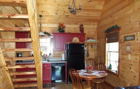 Kitchen 
table can be enlarged to seat 6