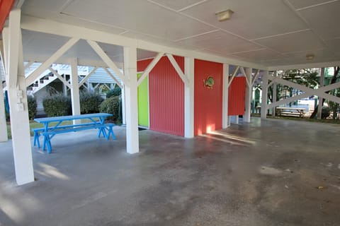 Picnic Table under the house and outdoor shower.