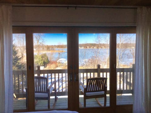 View of the lake from the upper level master bedroom.