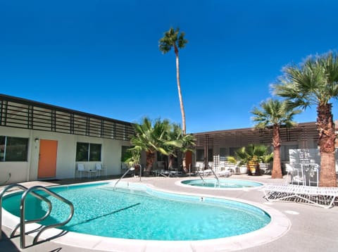 Sun-soaked poolside retreat with vibrant mid-century charm