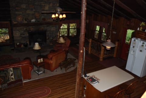 Kitchen Island and stairs to Game Room on right with Mountain Laurel Bannister